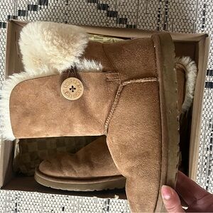 Tan Ugg boots with tan button. Size 8